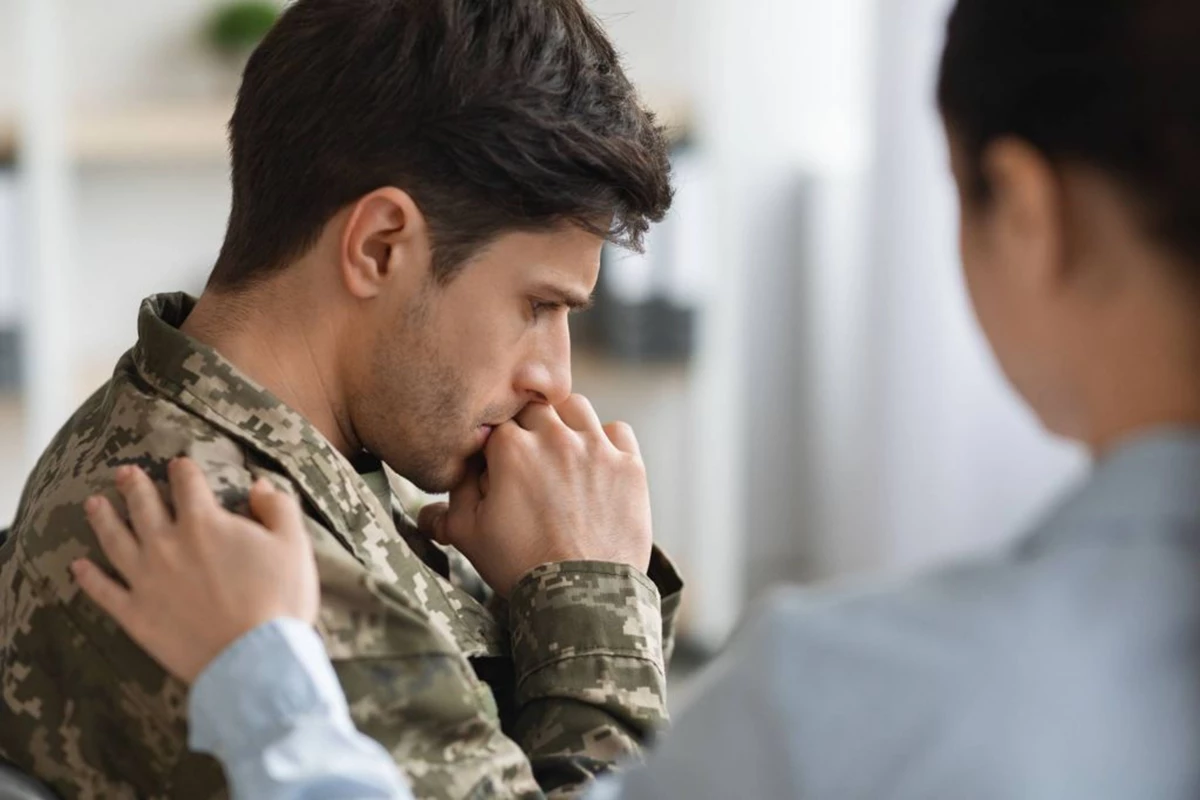 Unrecognizable Female Psychologist Comforting Mili 2022 02 04 04 37 31 Utc 1